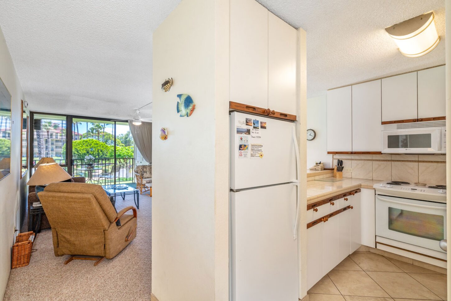 View of kitchen and to lanai and fountains