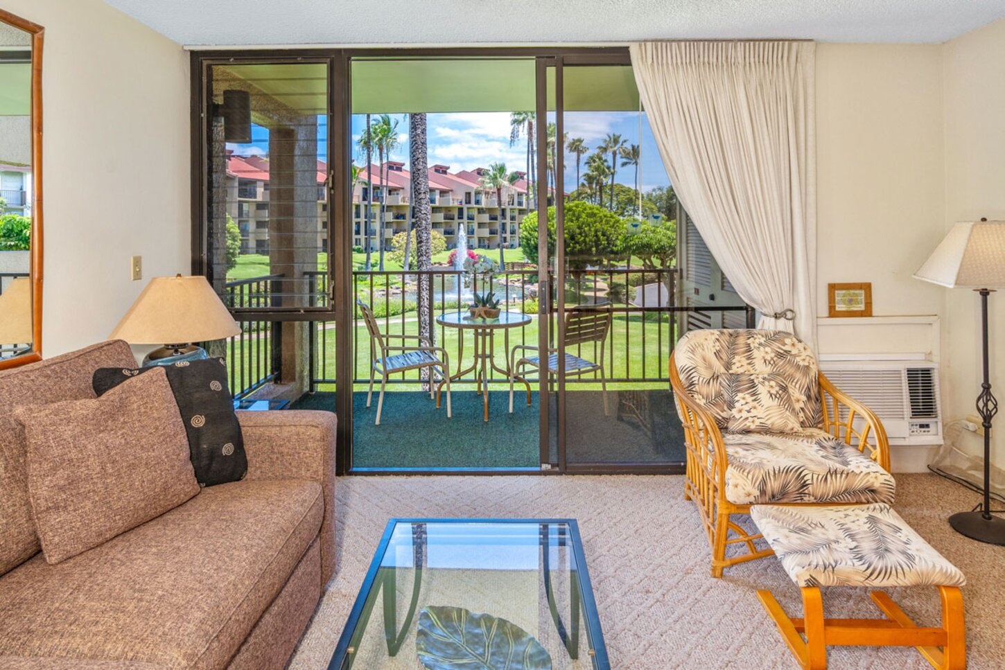 Leaving room with view to fountains and garden area
