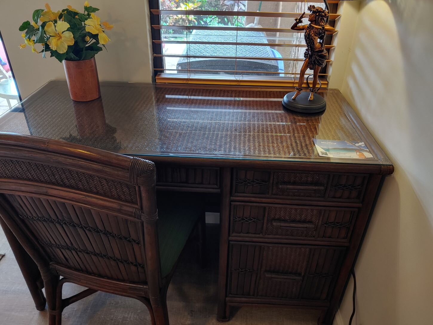 Room on Tommy Bahama writing desk for your laptop to work away from home.