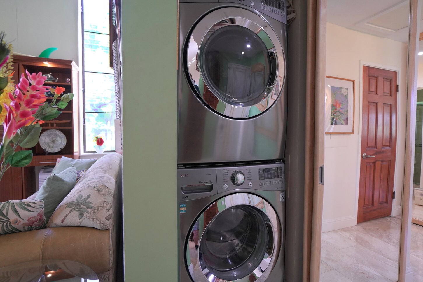 Washer/dryer in unit- hidden behind mirrored doors.