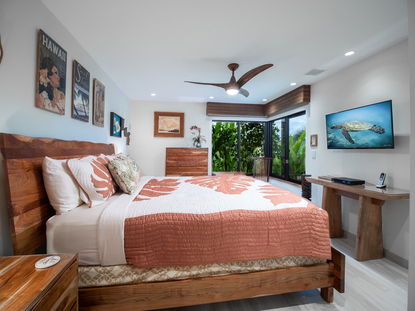 Guest bedroom also has a 40-inch smart 4K TV and a modest ocean view