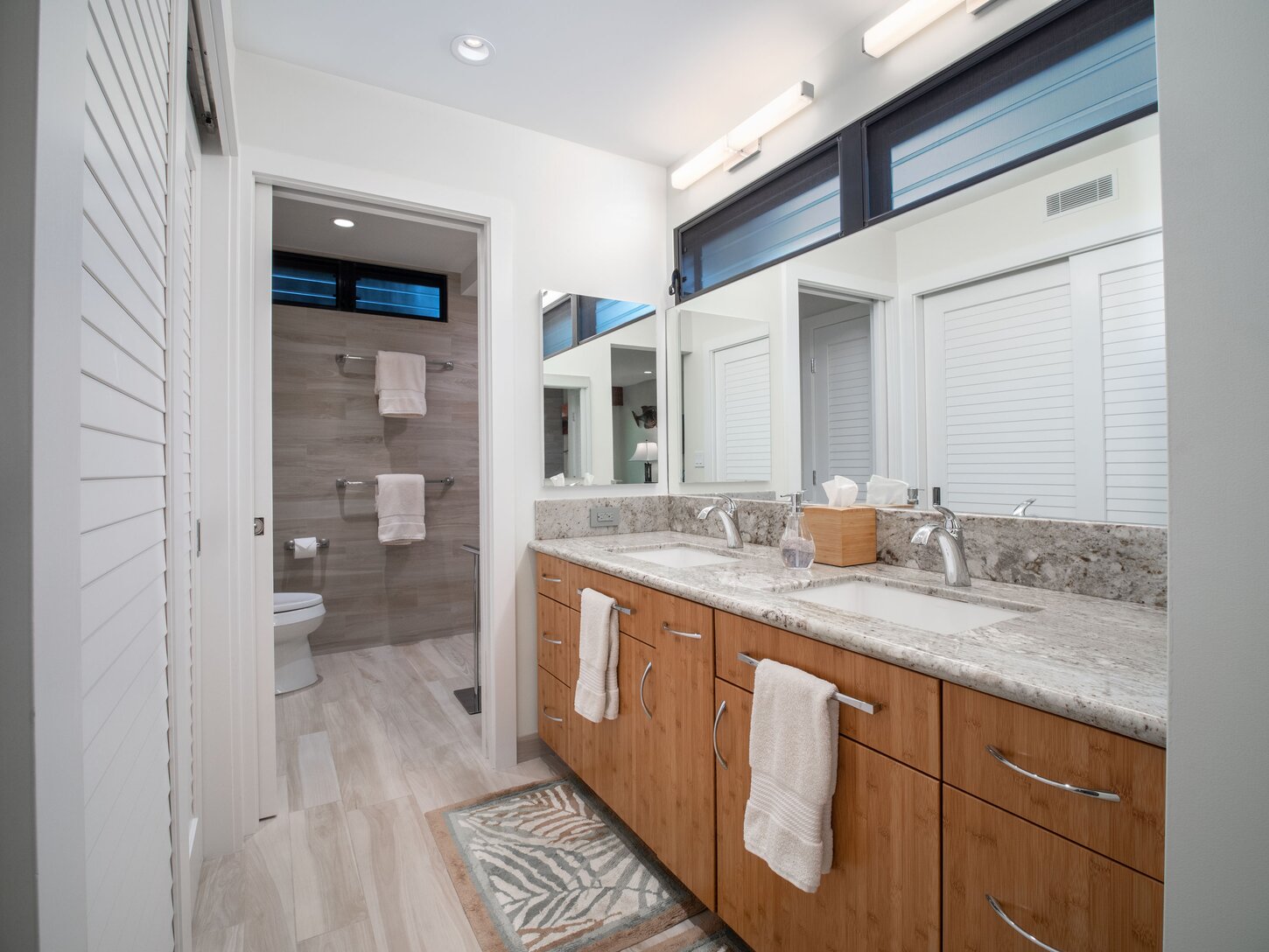 Master bedroom features en-suite bathroom vanity and shower spaces