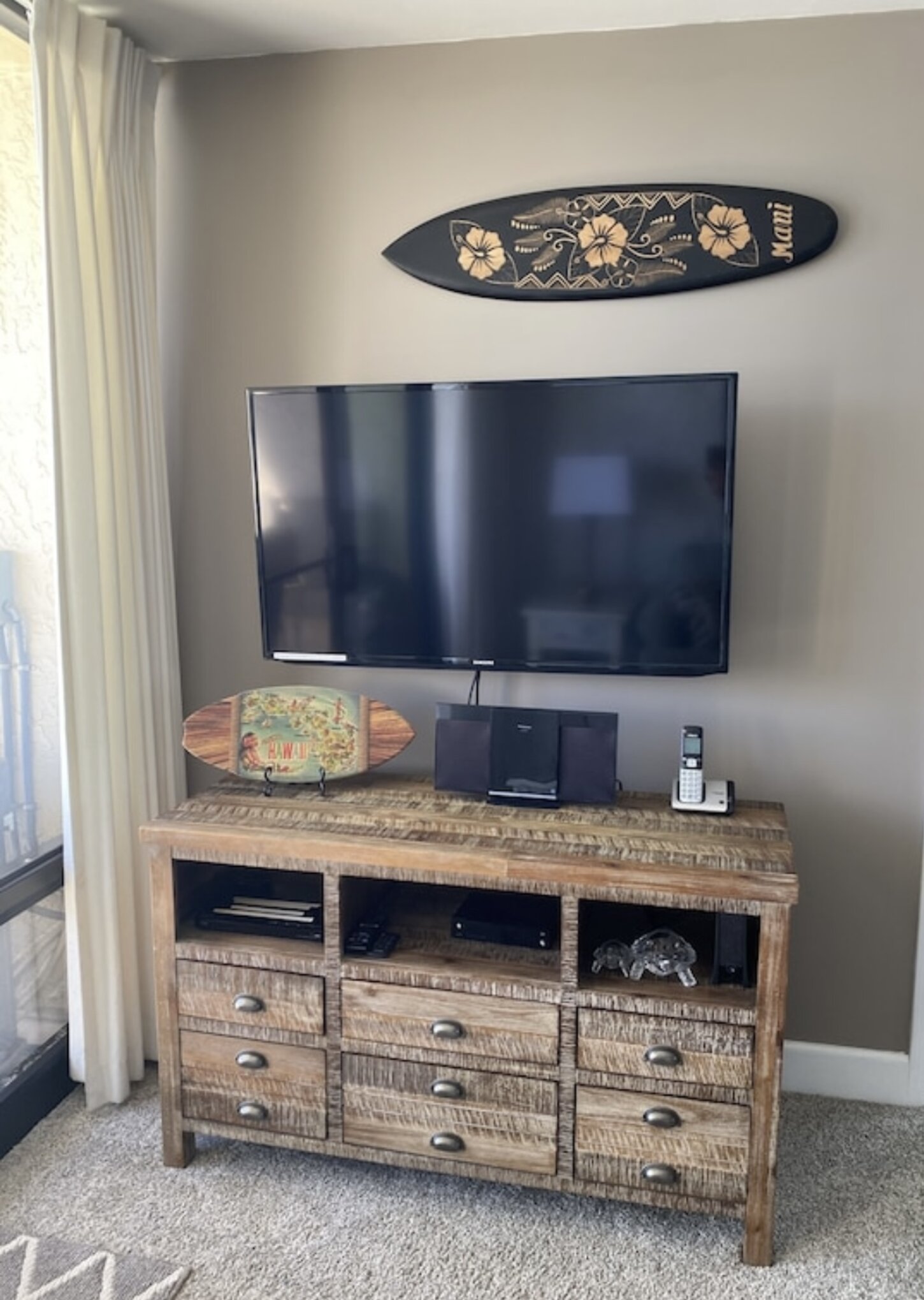Smart TV with streaming apps, cable, DVD, stocked with books, games, binoculars