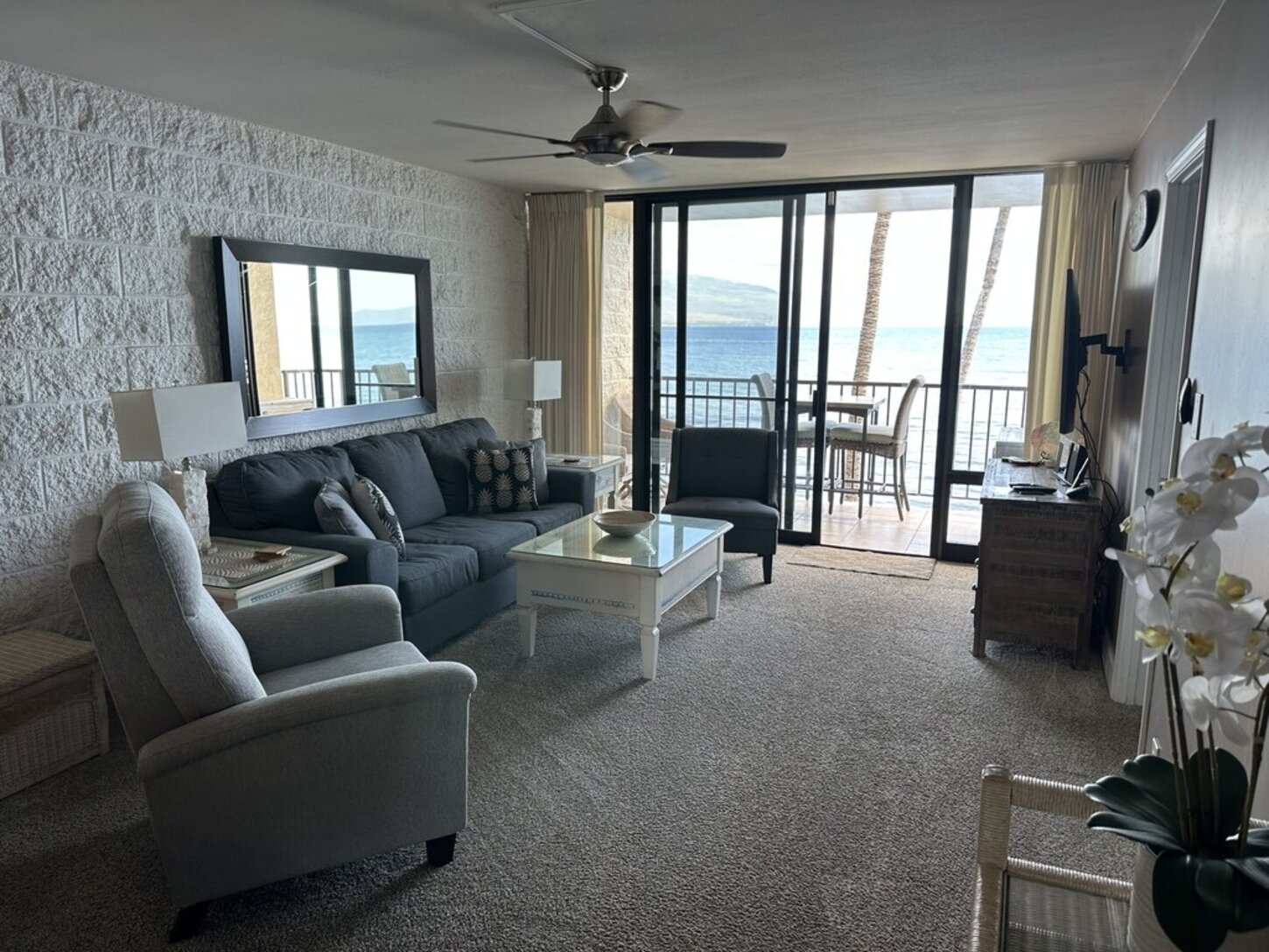 Living room with comfortable furniture to enjoy the amazing oceanfront views