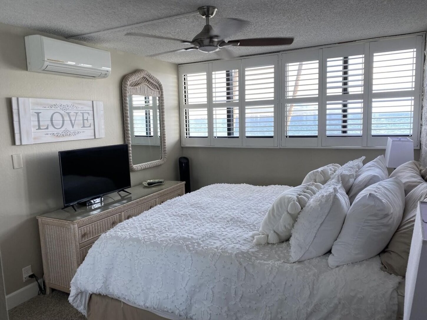 Master bedroom with comfortable King size bed, Split A/C and ceiling fan