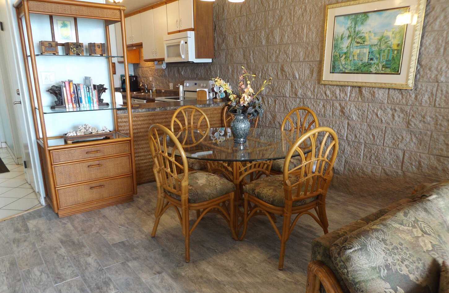 Dining for 6 + high chair or booster seat for little ones. Dine in or on lanai.