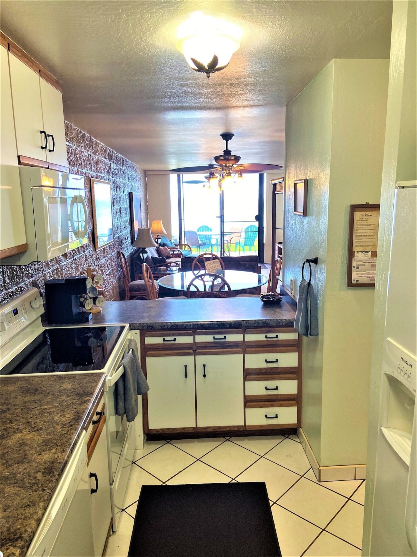 A view from the kitchen and lots of cooking utensils to make any meal.