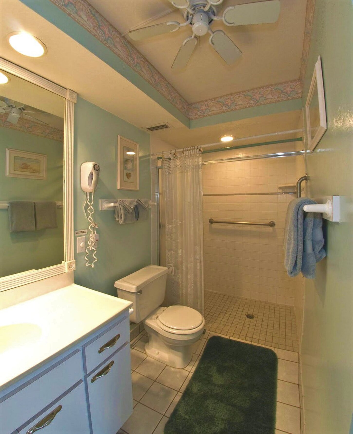 Old photo: Wheelchair accessible, but unit not ADA compliant. + roll-off lanai.