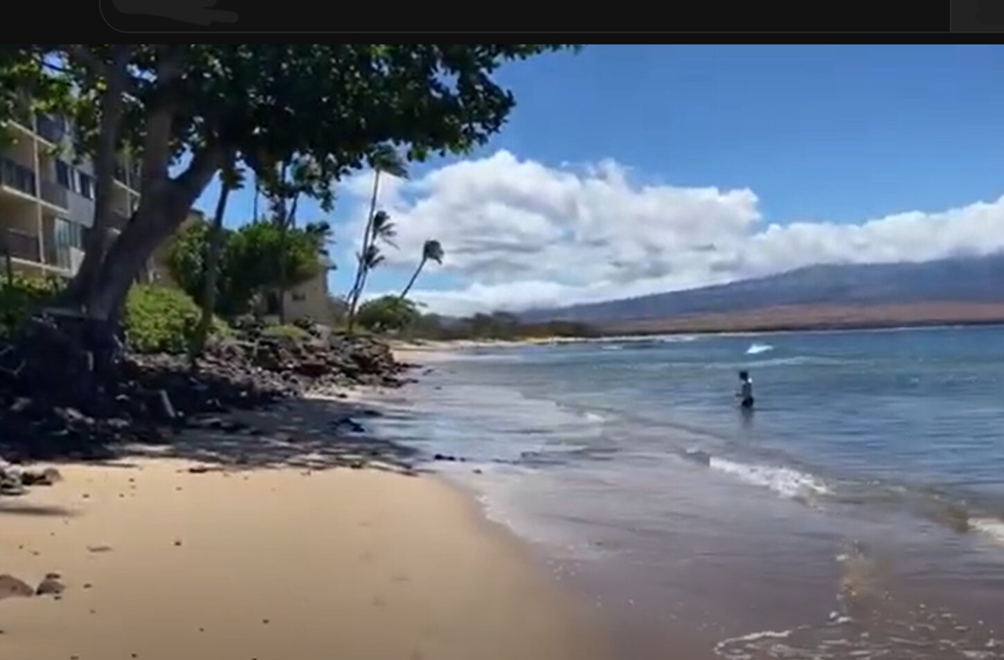 Aug 2025, one of my grandsons in front of Kanai A Nalu.