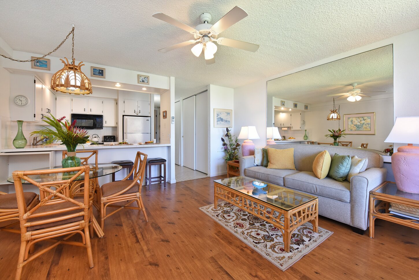 Living room with dining table, breakfast bar & sofa bed