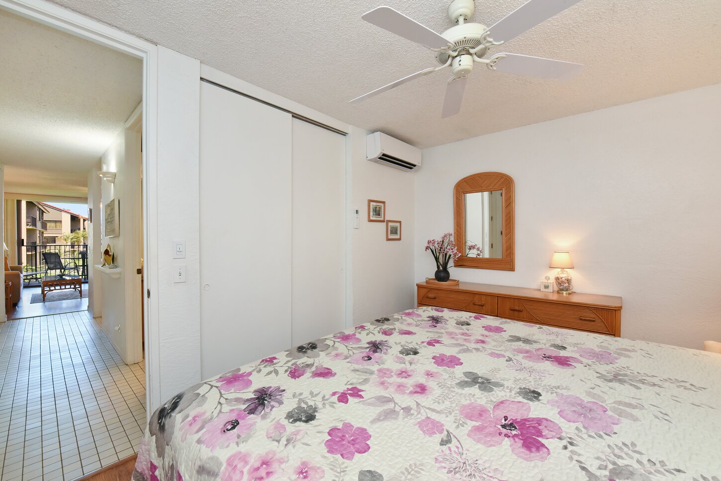 AC unit with remote in bedroom