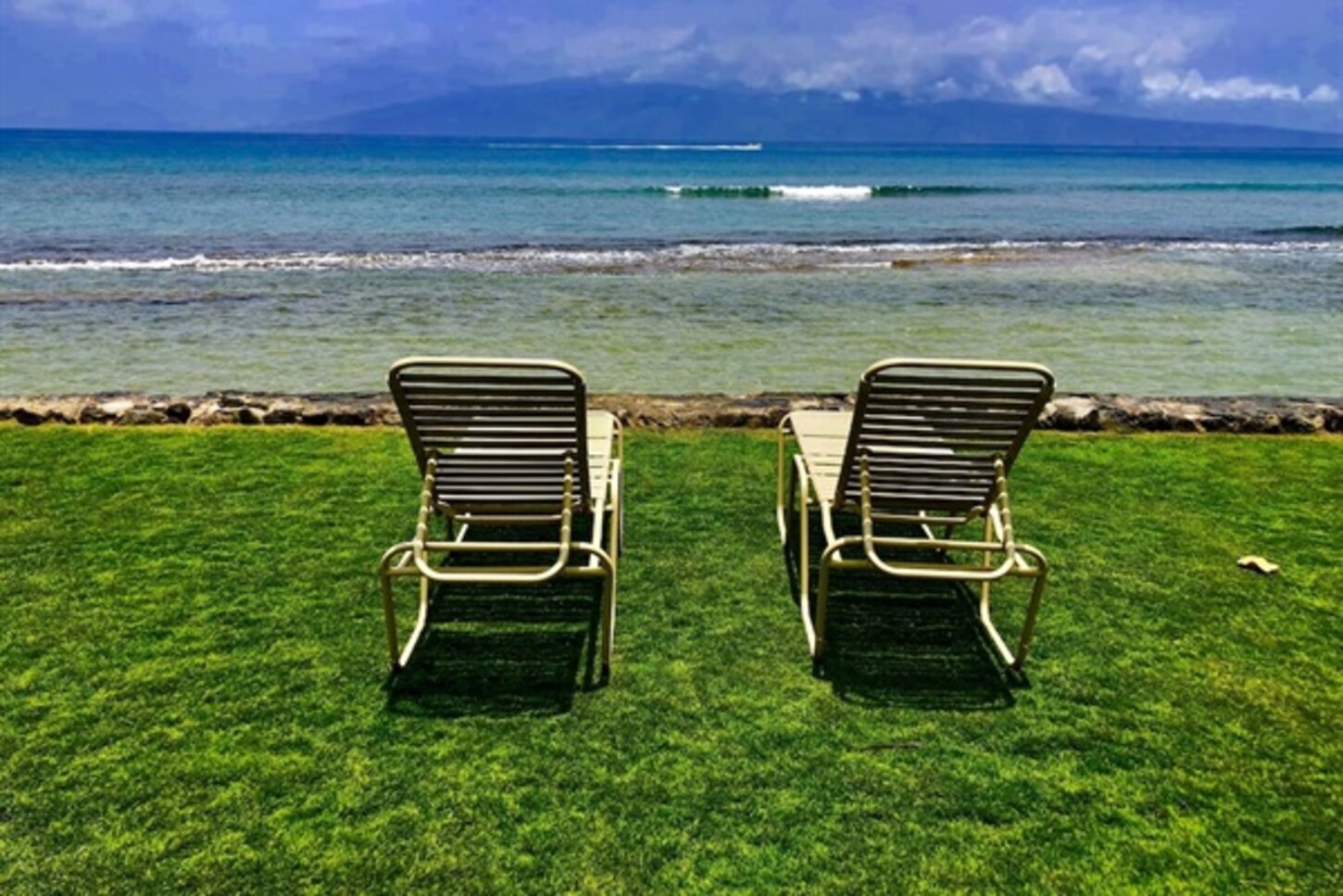 Oceanfront lawn area to relax on lounge chairs and enjoy the ocean and sunsets!
