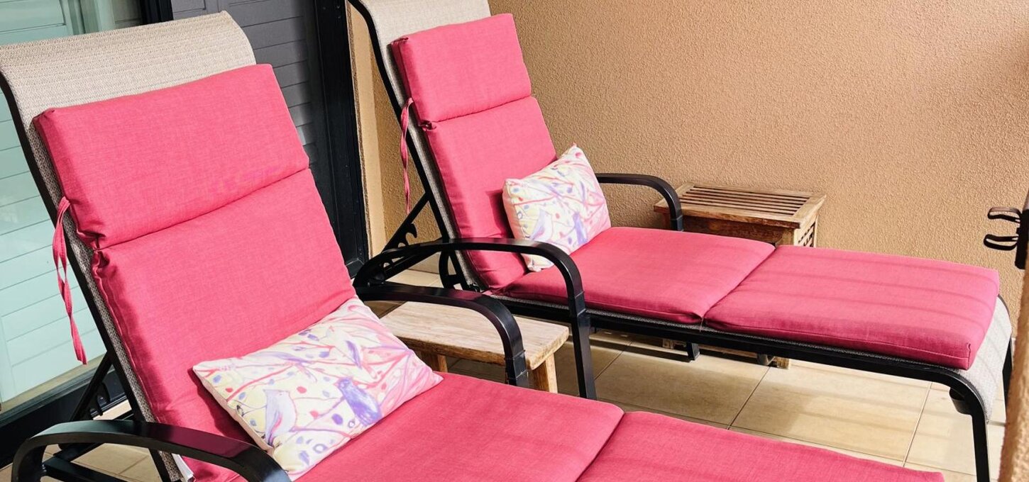 Comfortable chaise lounges on lanai