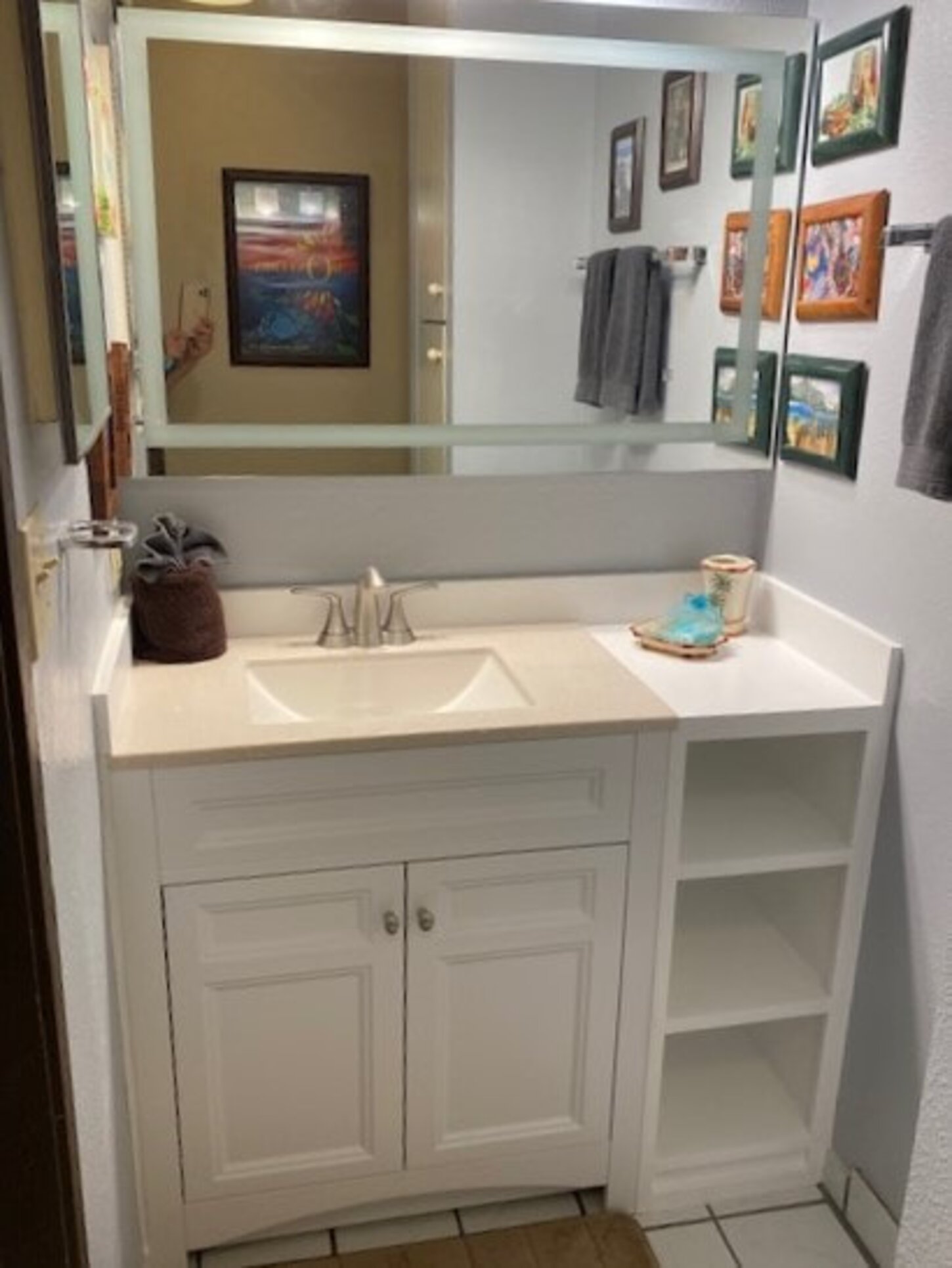 Vanity is Adjacent to the Shower and Washer/Dryer