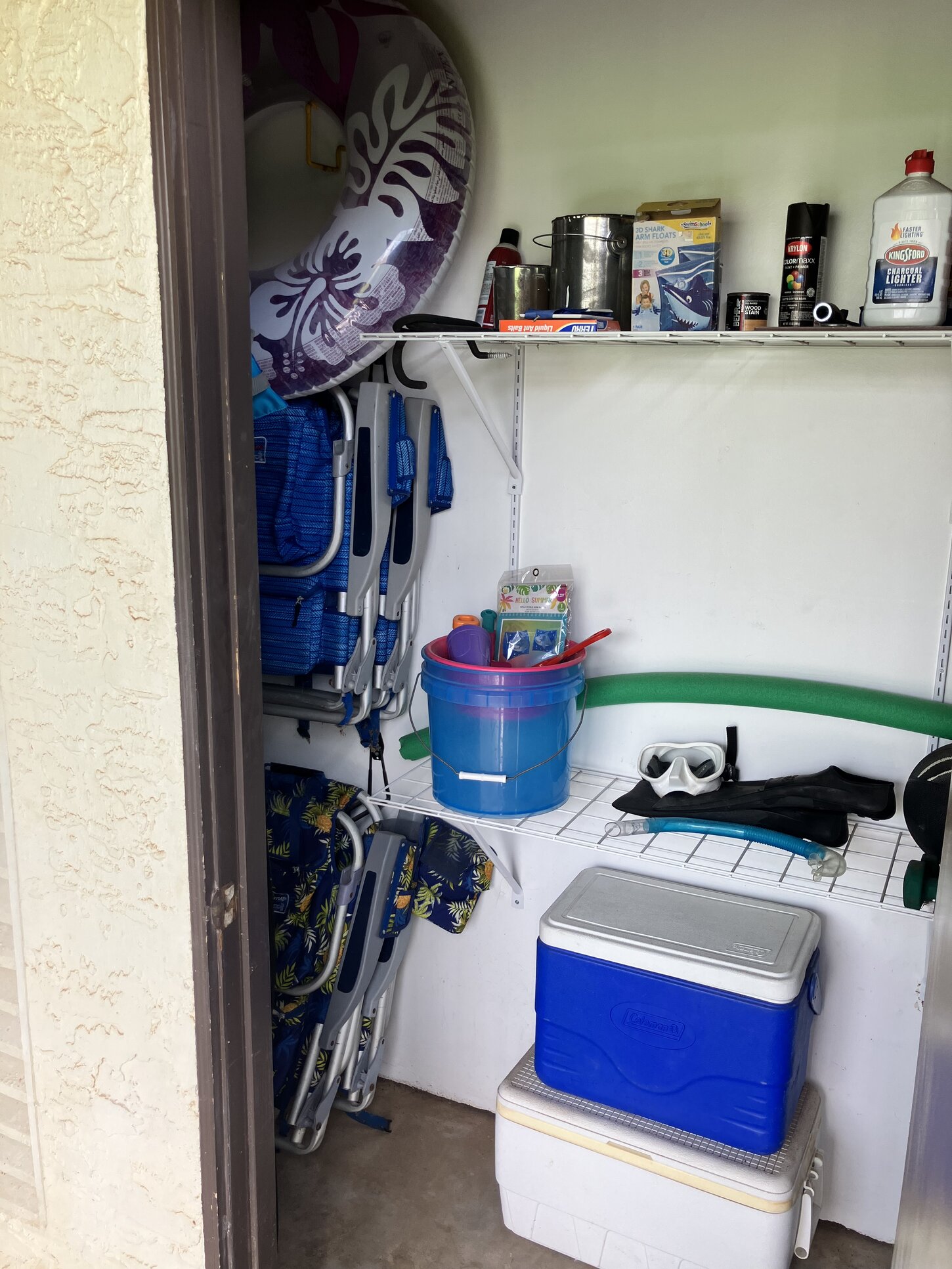 Inside the lanai closet are the beach chairs, beach umbrella, coolers etc