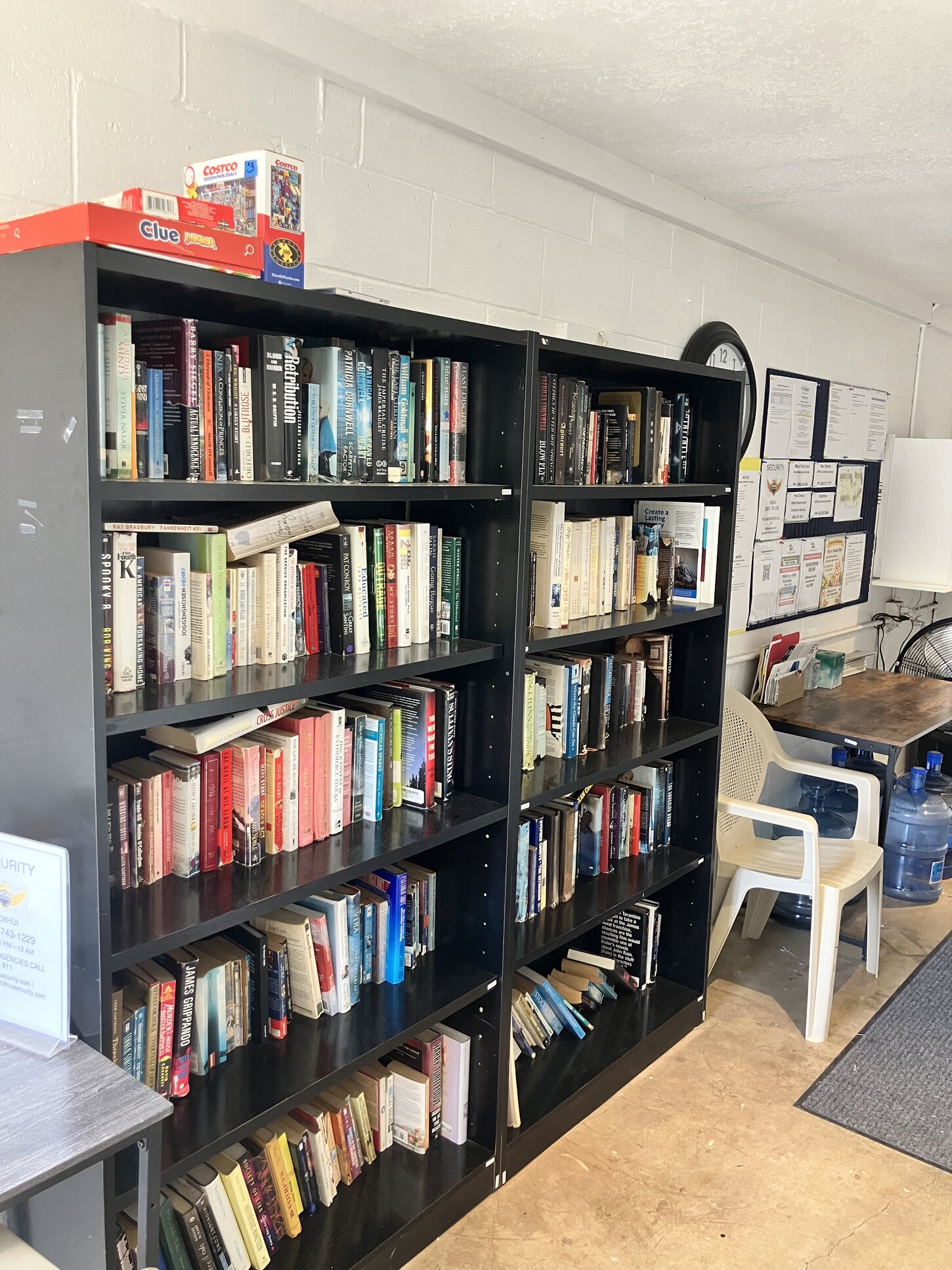 Book trade shelves in the space next to the tennis court