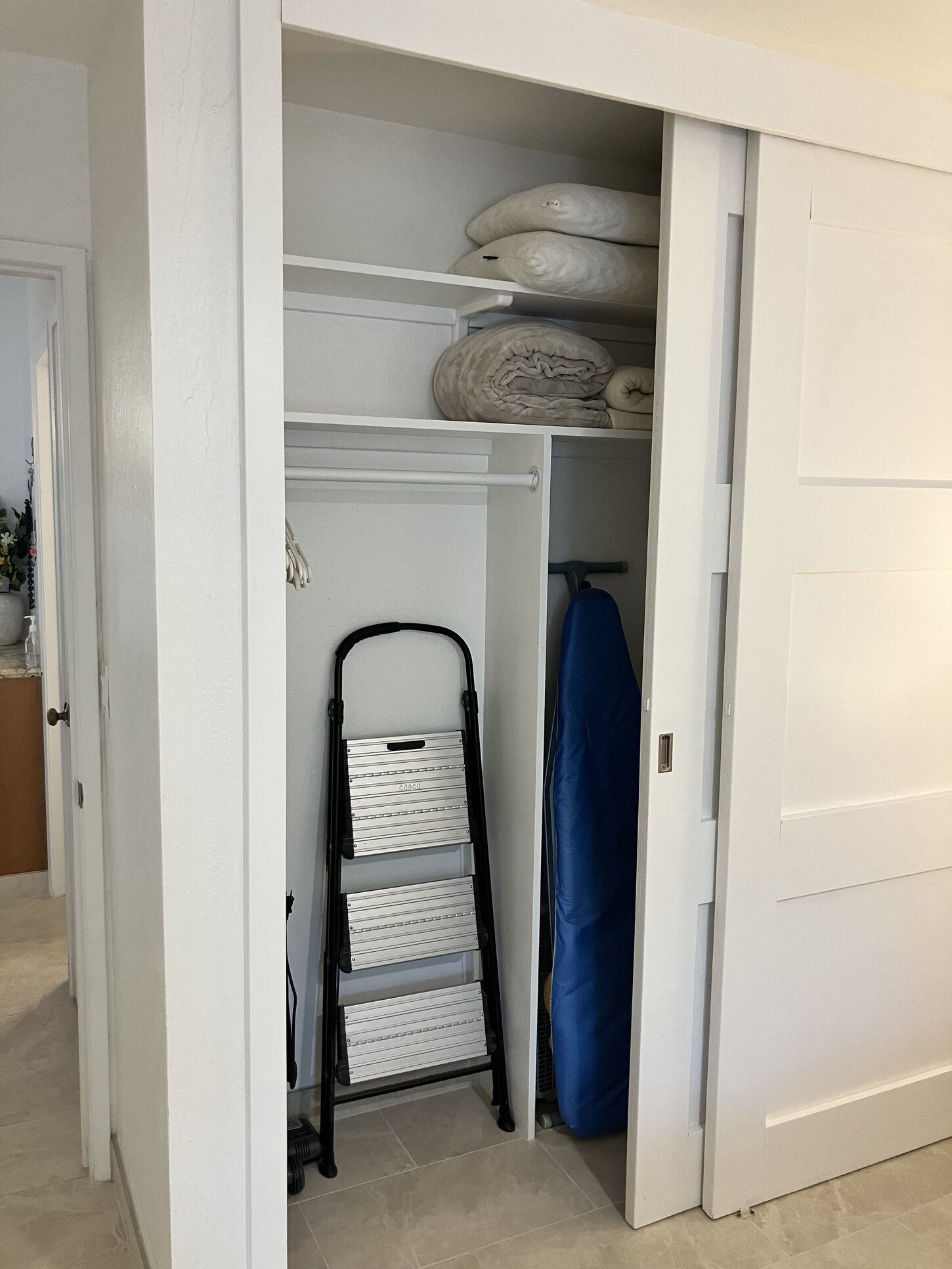 Large closet to hang clothes and store suitcases