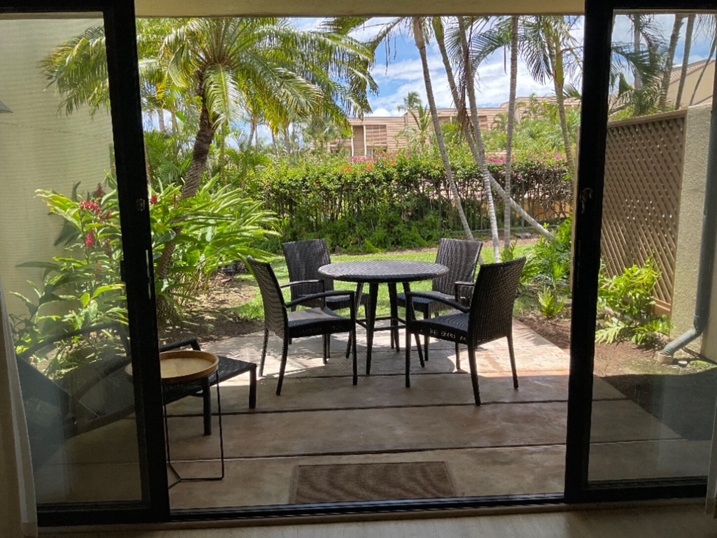 Private dining lanai with new table and lounger!