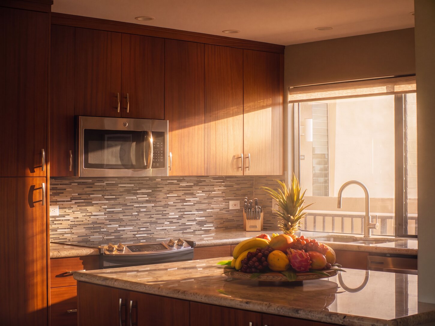 Full kitchen with mahogany cabinets.