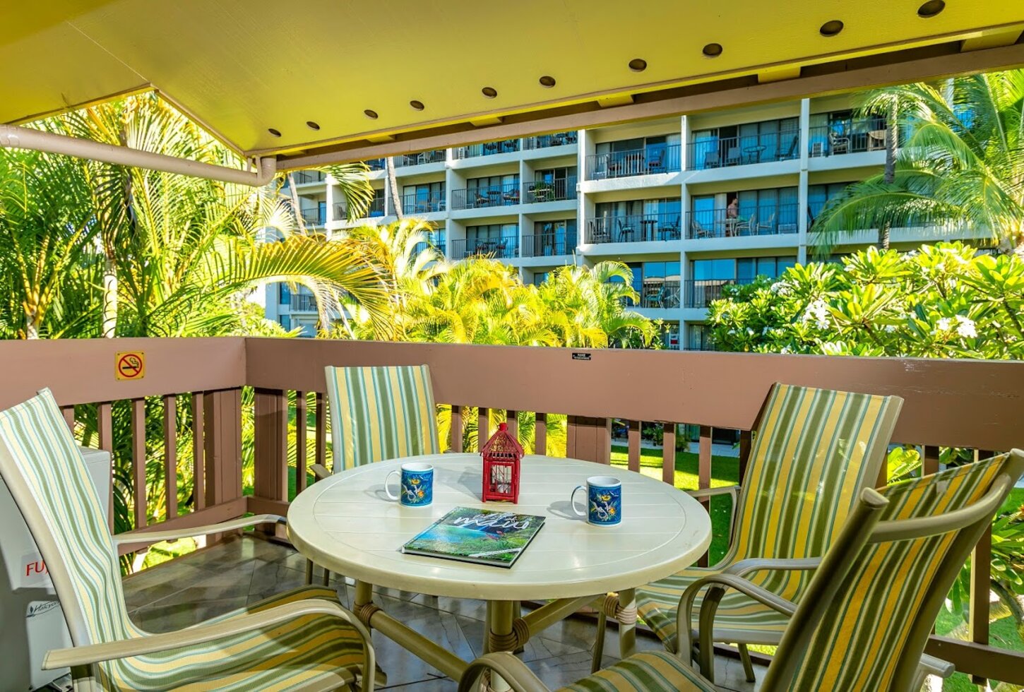 Surrounded by lush greenery the Lanai is a Relaxed space for morning coffee