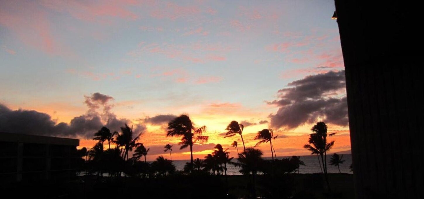 Enjoy beautiful Hawaiian sunsets from our condo or walk to the beach just a few steps away. 